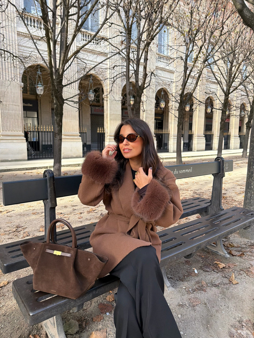 Women's brown long coat with tie belt and fur cuffs