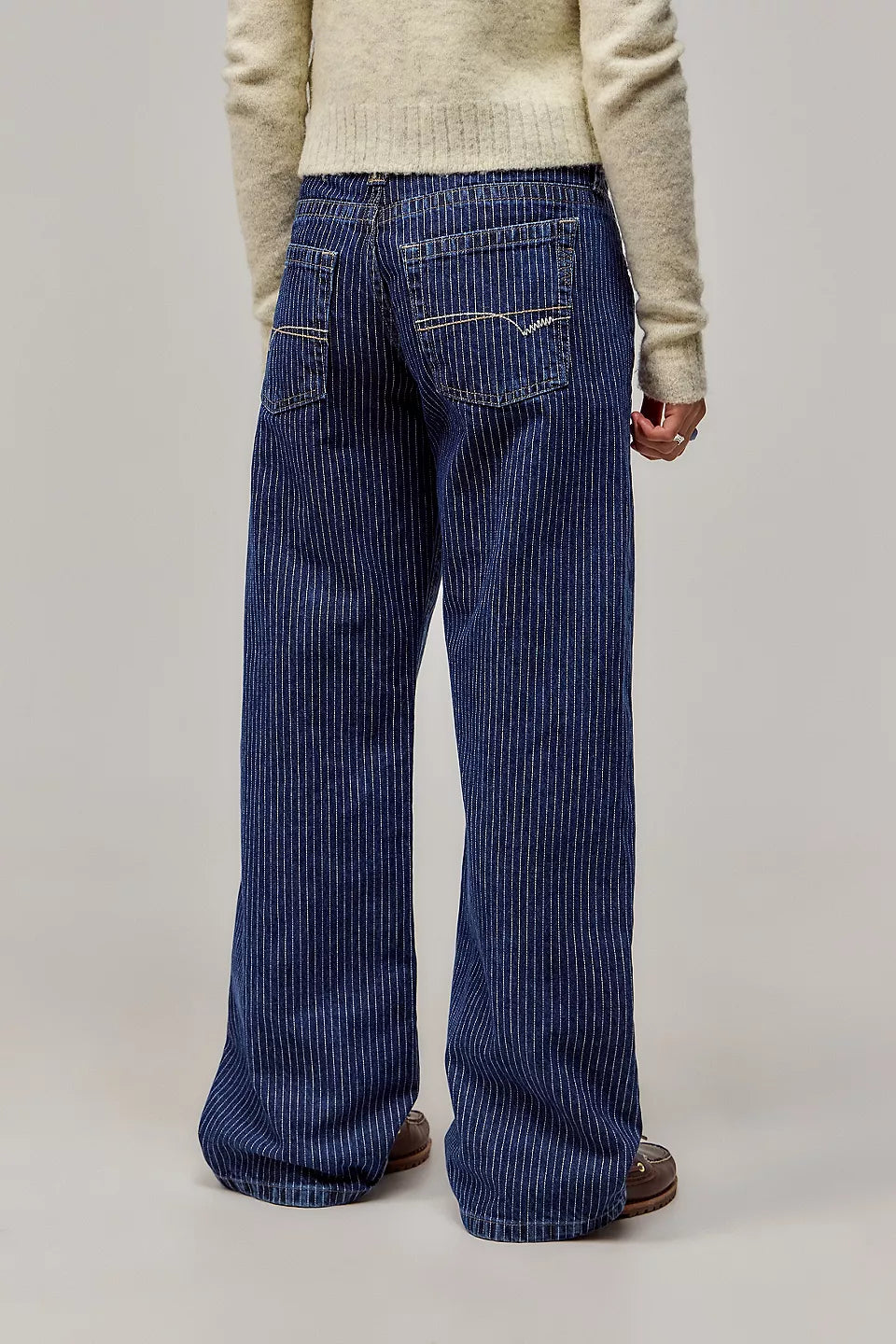 Women's wide-leg pinstripe jeans with high-rise waist and front pockets