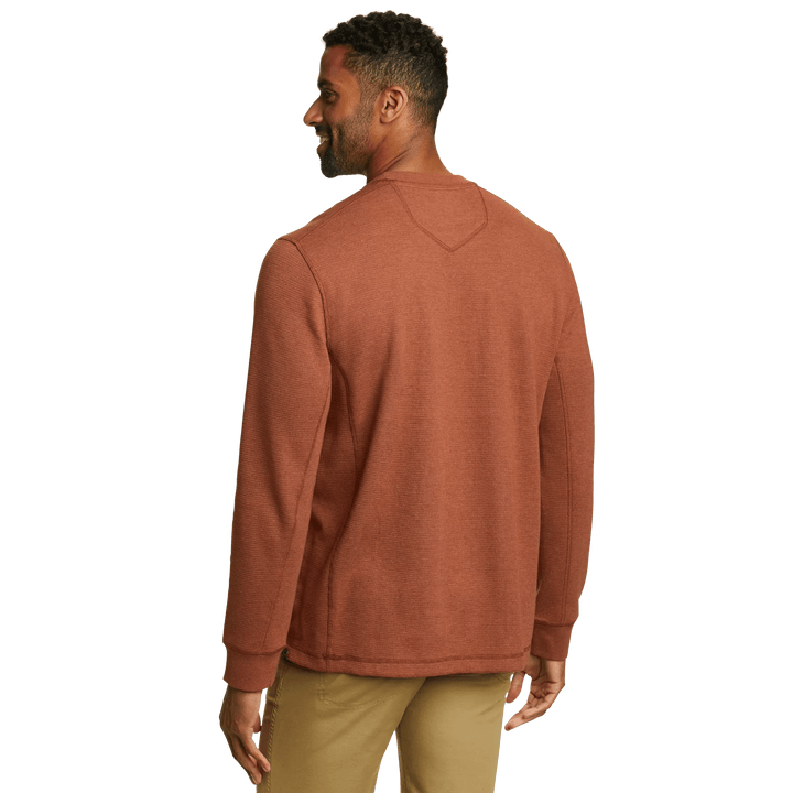 Men's long sleeve crew neck top with fine ribbed texture and cuffed sleeves