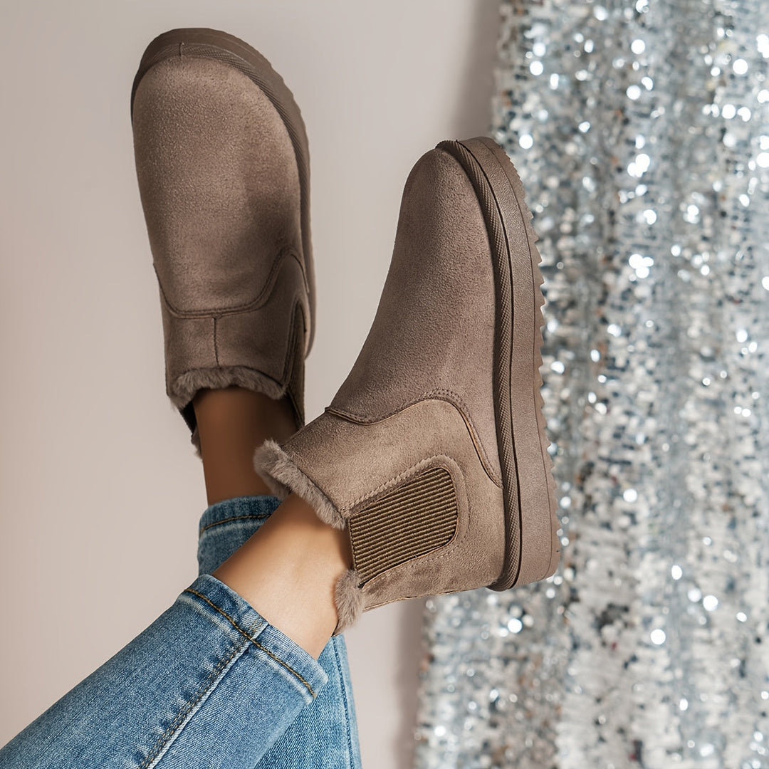 Women's winter ankle boots with faux fur lining and elastic side panels