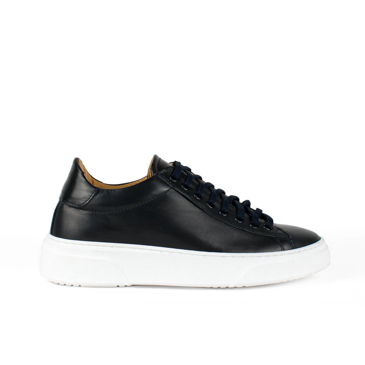 Black low-top lace-up sneaker with white platform sole