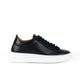 Black low-top lace-up sneaker with white platform sole