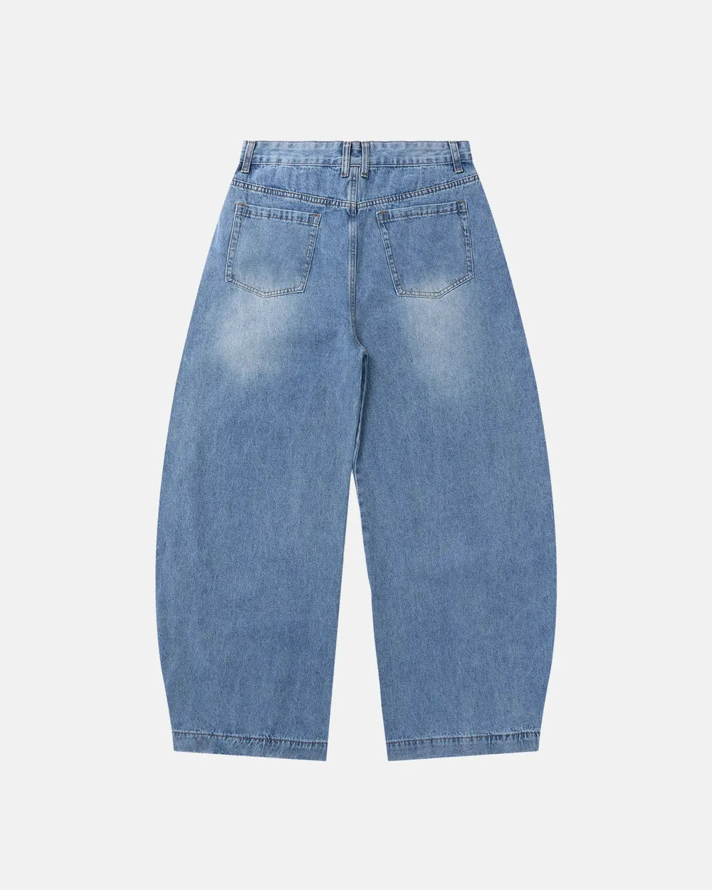 Light blue barrel jeans with dark script graphic on one leg