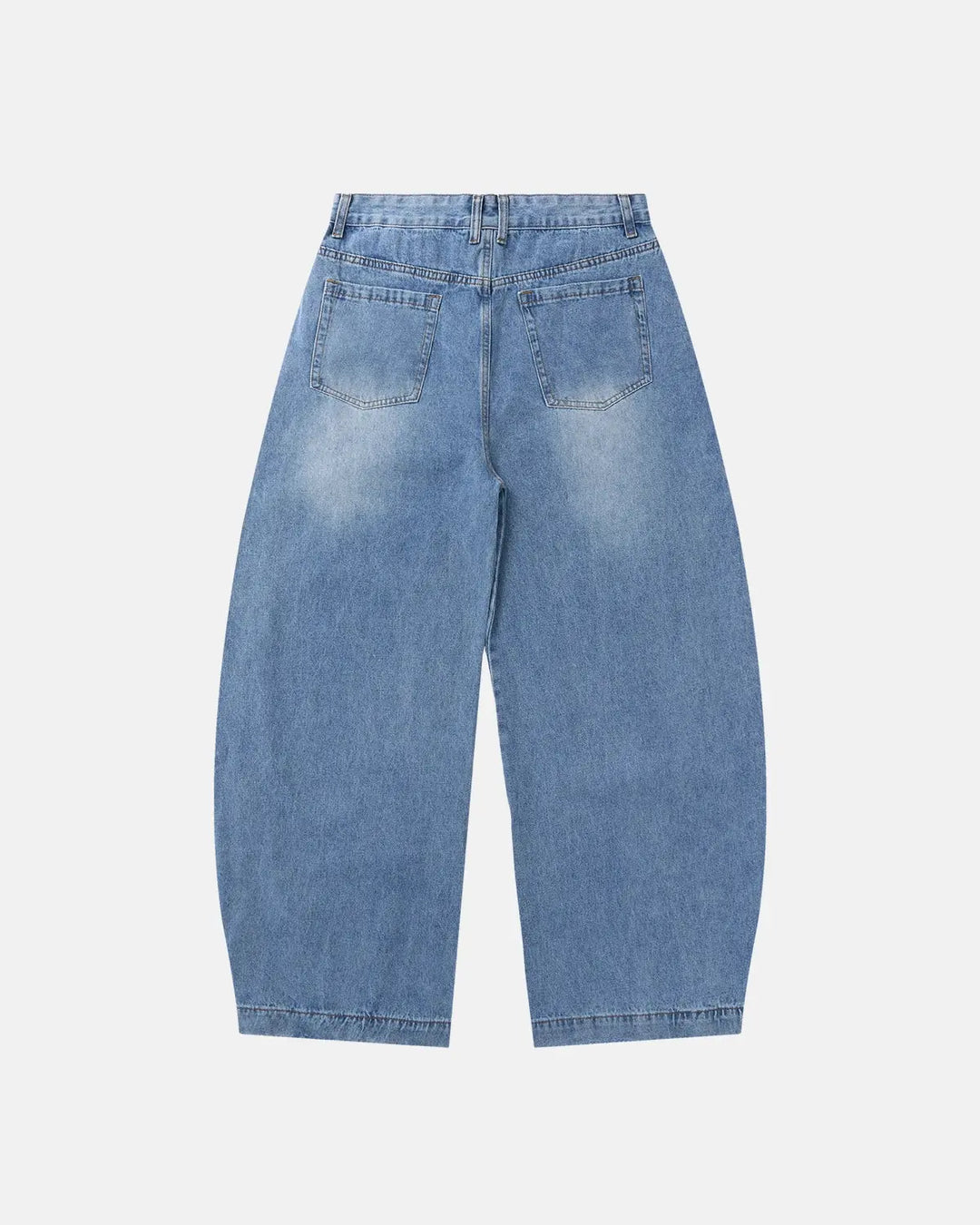 Light blue barrel jeans with dark script graphic on one leg