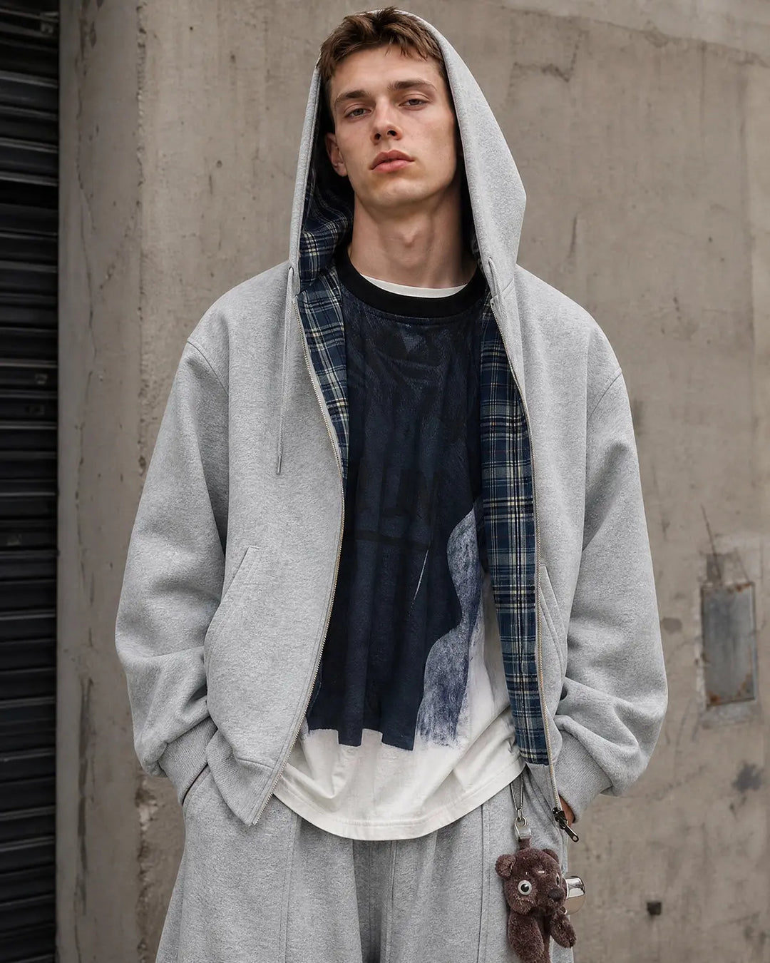 Men's grey reversible hooded jacket with plaid lining and front zip