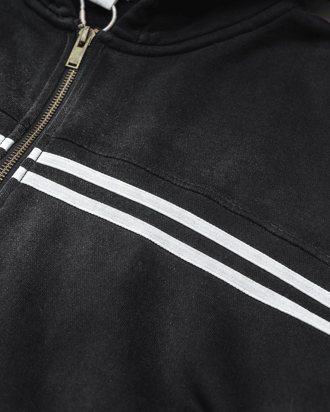 Men's black zip-up hoodie with white chest and sleeve stripes