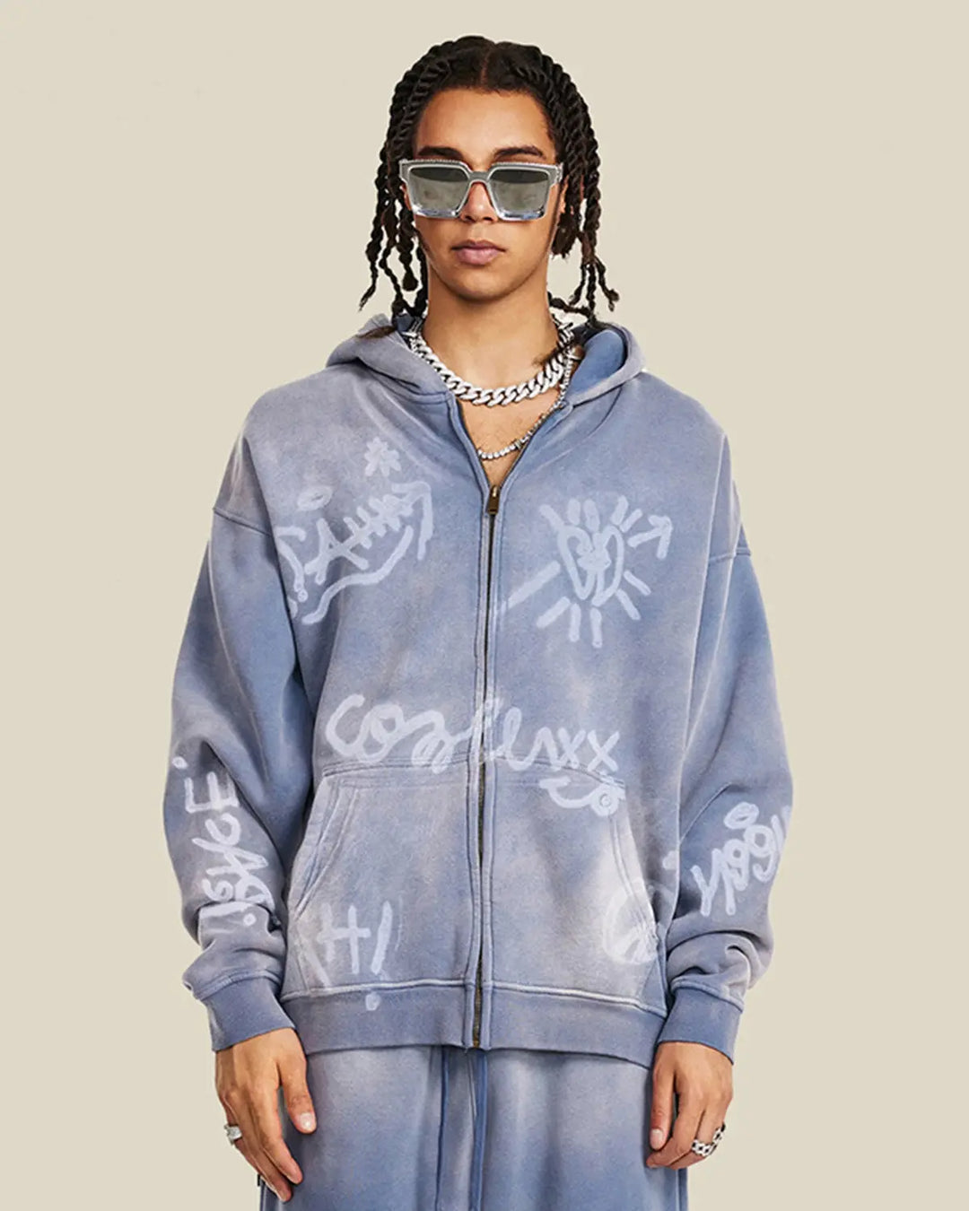 Washed zip-up hoodie with graffiti-style lettering and front pockets
