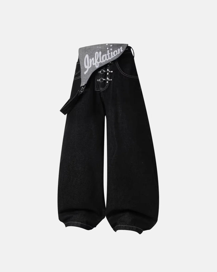 Black asymmetric denim overalls with buckle details and wide legs