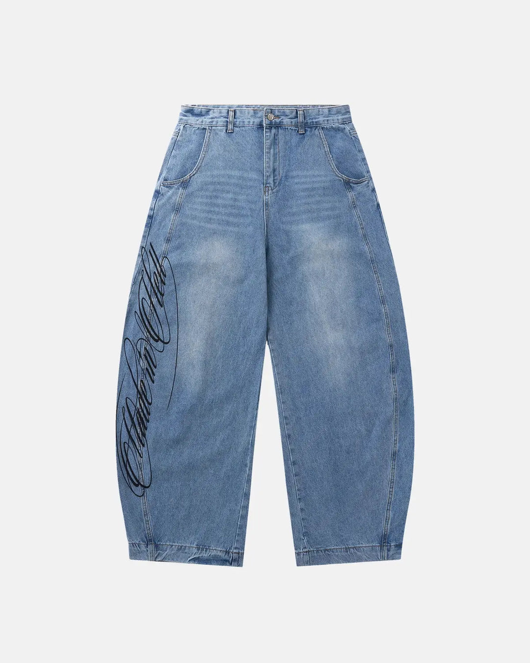 Light blue barrel jeans with dark script graphic on one leg