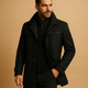 Men's structured winter coat with high collar, button and zip front, chest pocket and adjustable cuffs