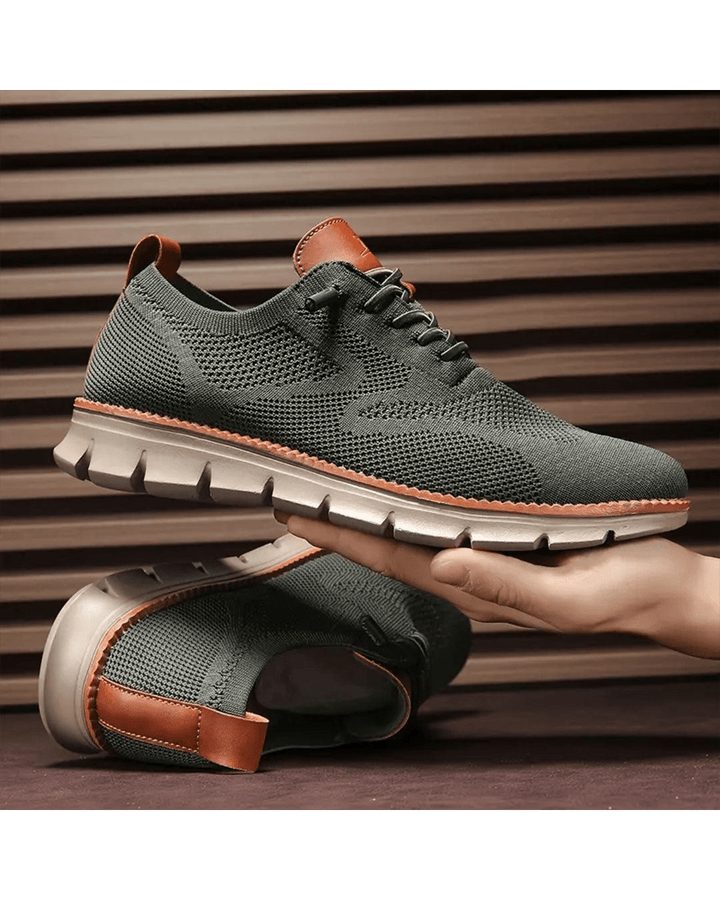 Unisex lace-up sneakers with textured panels and a white segmented sole
