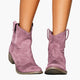 Women's western boots with pull tabs and stitched panels