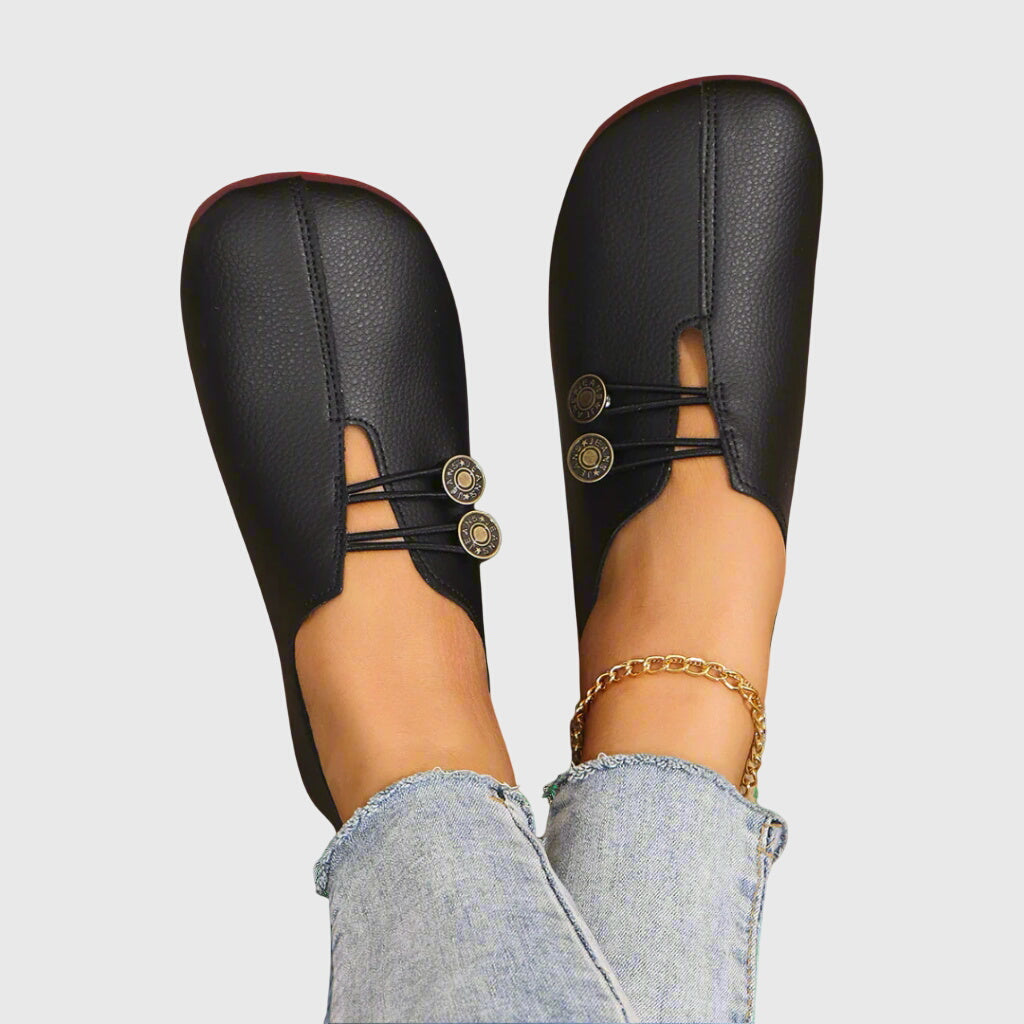 Women's lace-up ballet flats with round toes and button details