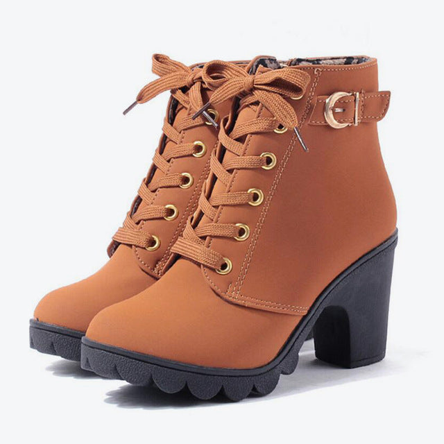 Women's lace-up heeled ankle boots with buckle straps