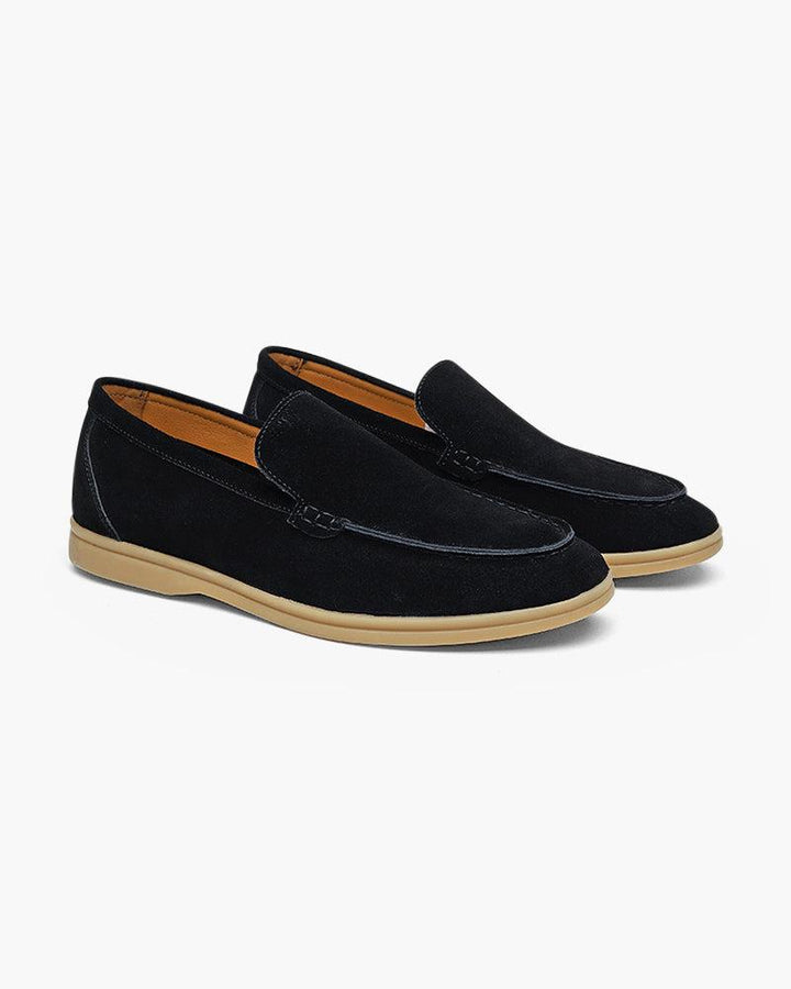 Unisex slip-on loafers with penny strap detail and flat soles