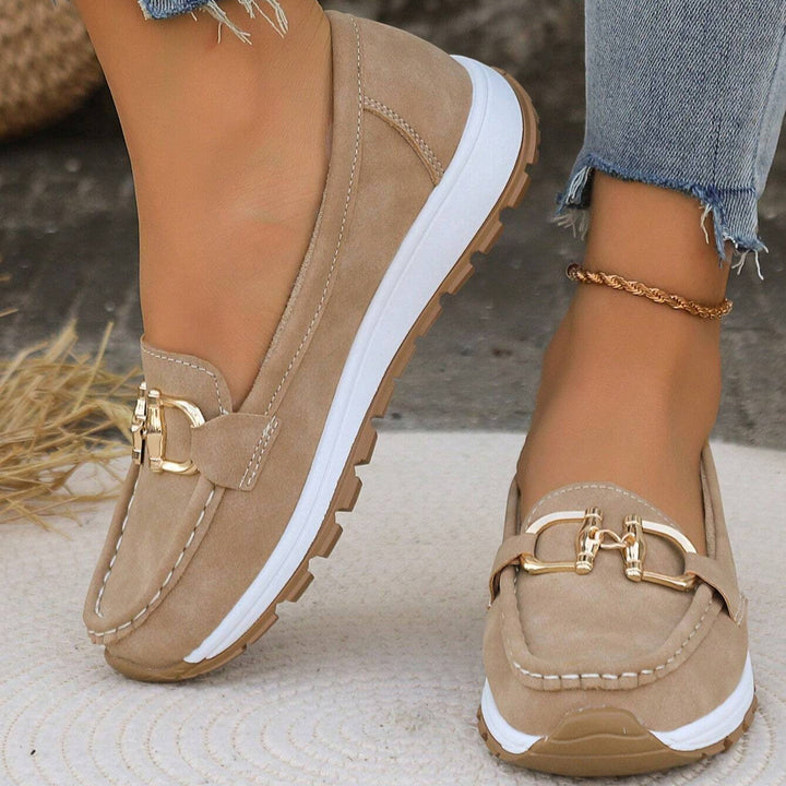 Women's buckle loafers with moc toe and flat textured sole