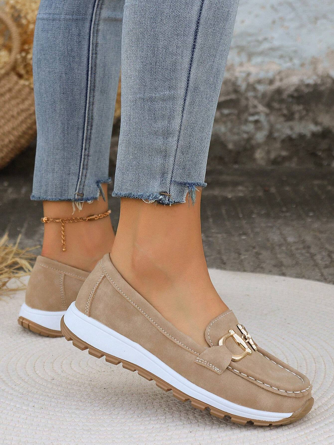 Women's buckle loafers with moc toe and flat textured sole