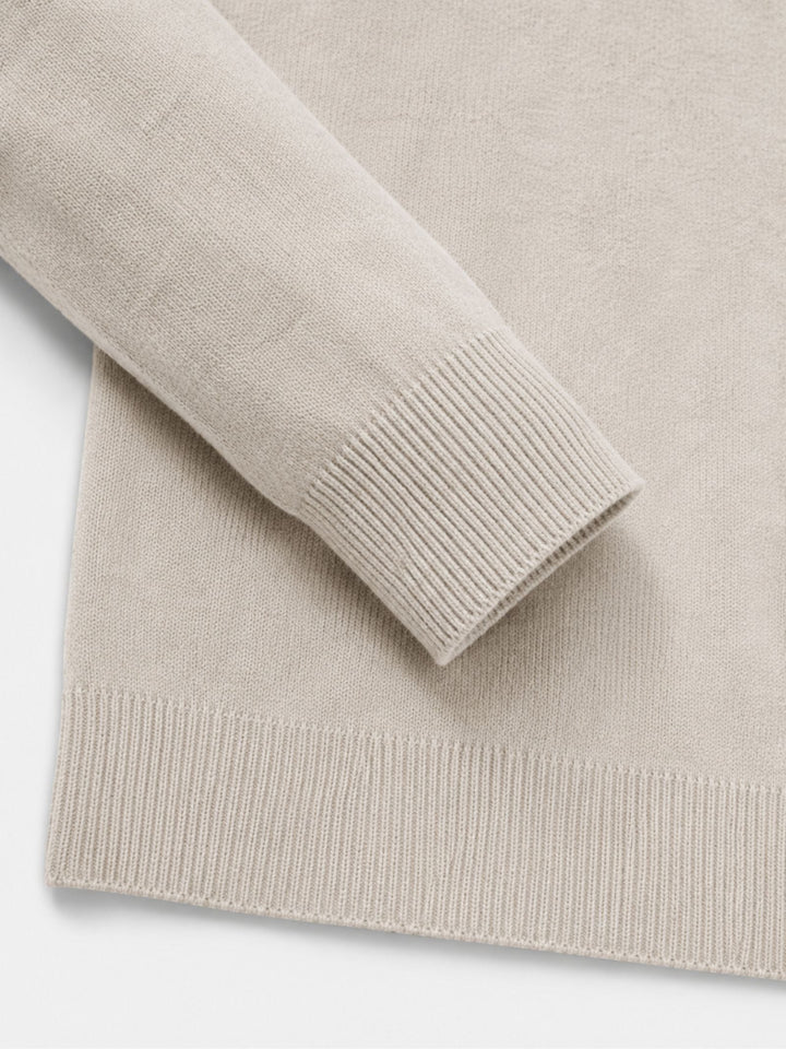 Men's beige crew neck sweater with half-zip and ribbed cuffs