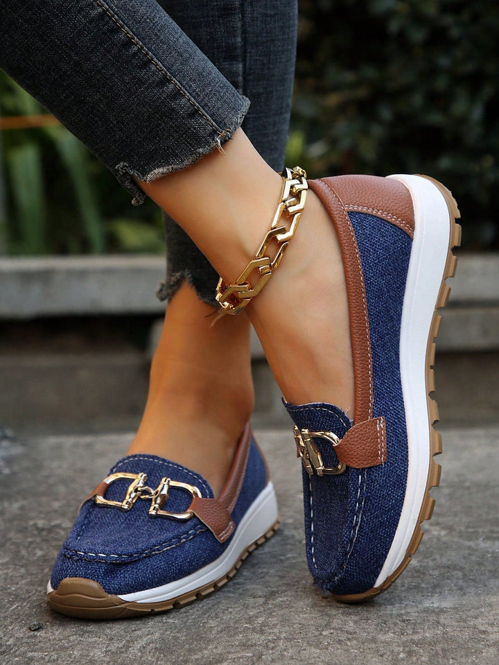 Women's buckle loafers with moc toe and flat textured sole