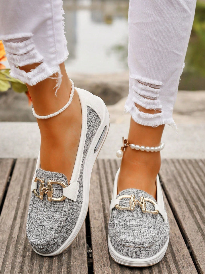 Women's buckle loafers with moc toe and flat textured sole
