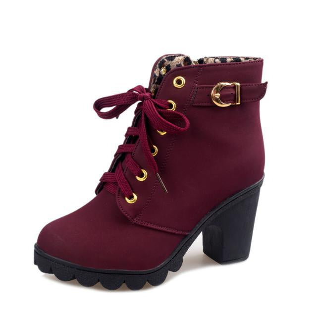 Women's lace-up heeled ankle boots with buckle straps