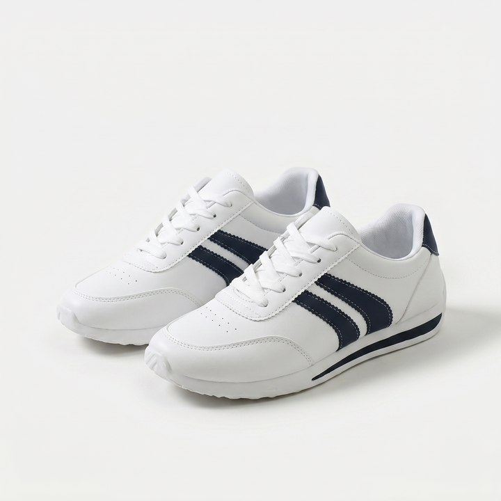 White lace-up trainers with navy side stripes and flat soles