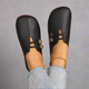Moccasin loafers with rounded toes, lace detail and flat soles