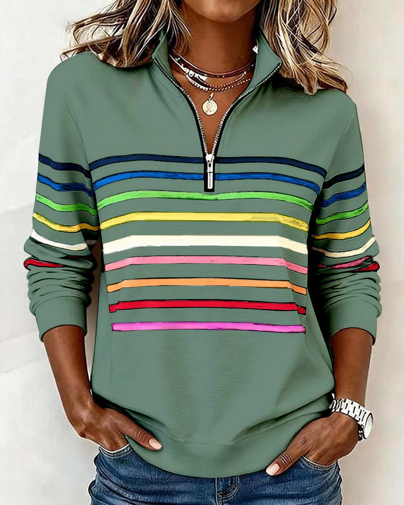 Women's striped half-zip sweatshirt with long sleeves and ribbed trims