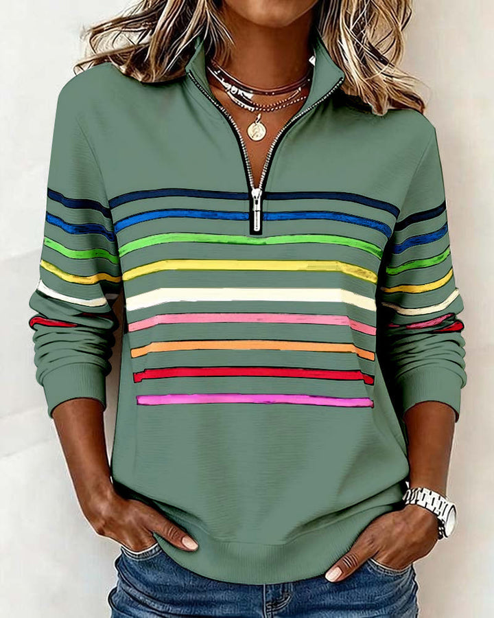 Women's striped half-zip sweatshirt with long sleeves and ribbed trims