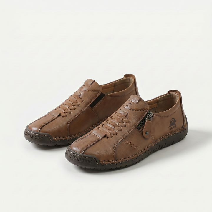 Low-top lace-up trainers with side zip and flat textured soles