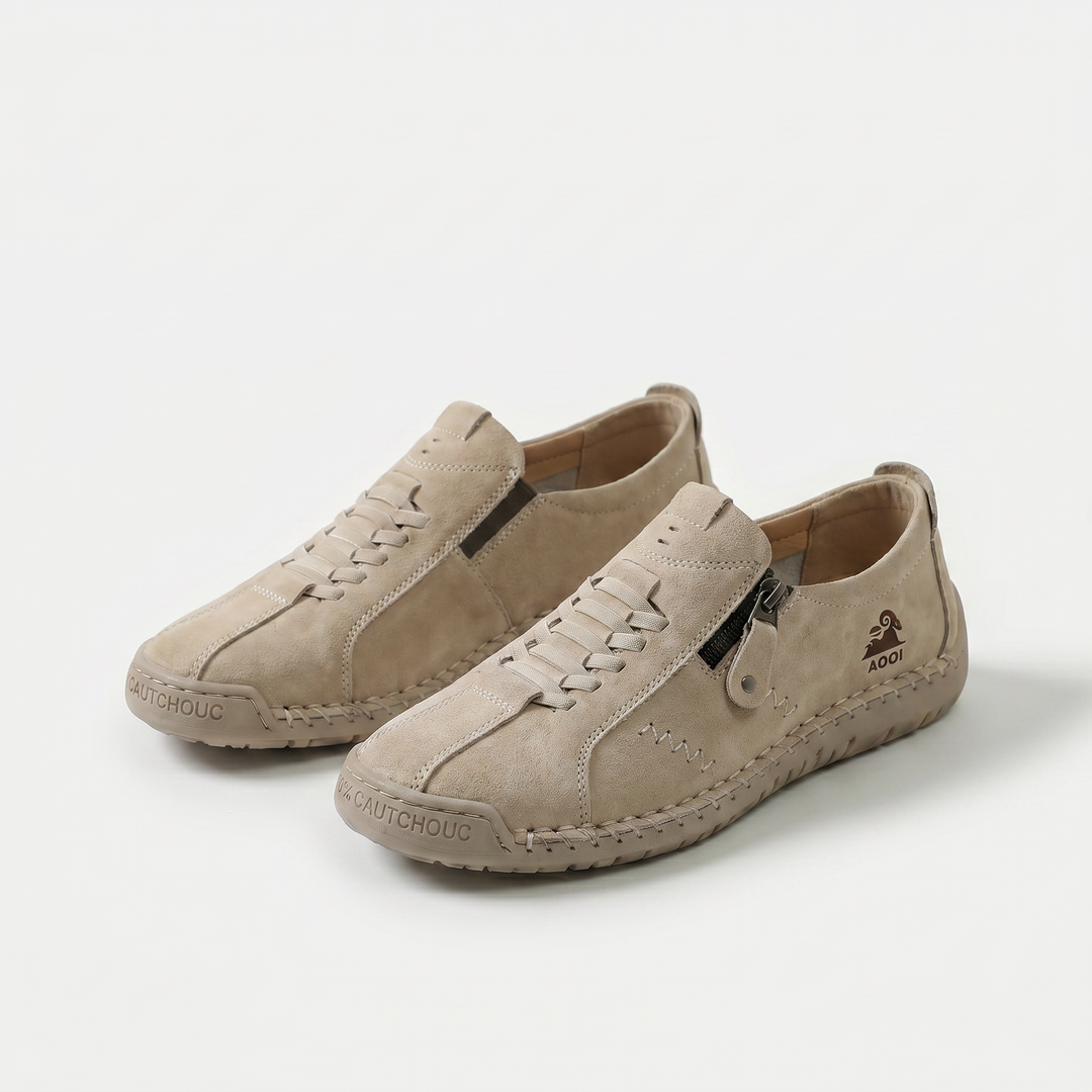 Low-top lace-up trainers with side zip and flat textured soles