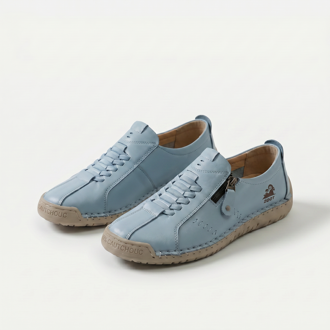 Low-top lace-up trainers with side zip and flat textured soles