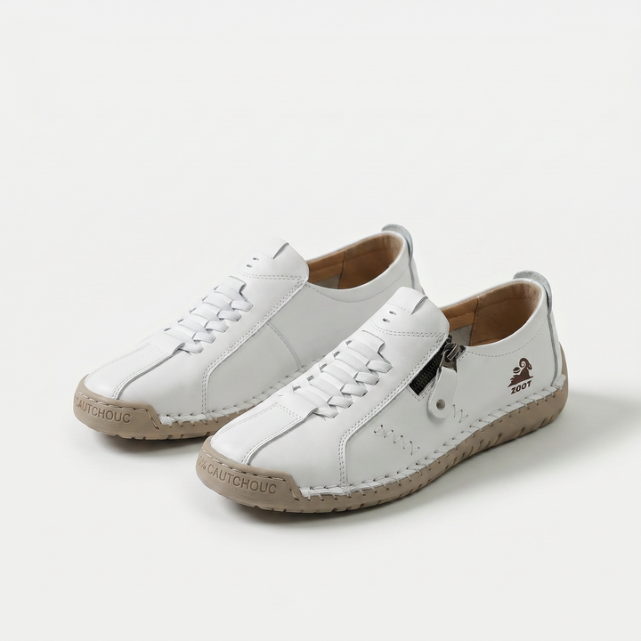 Low-top lace-up trainers with side zip and flat textured soles