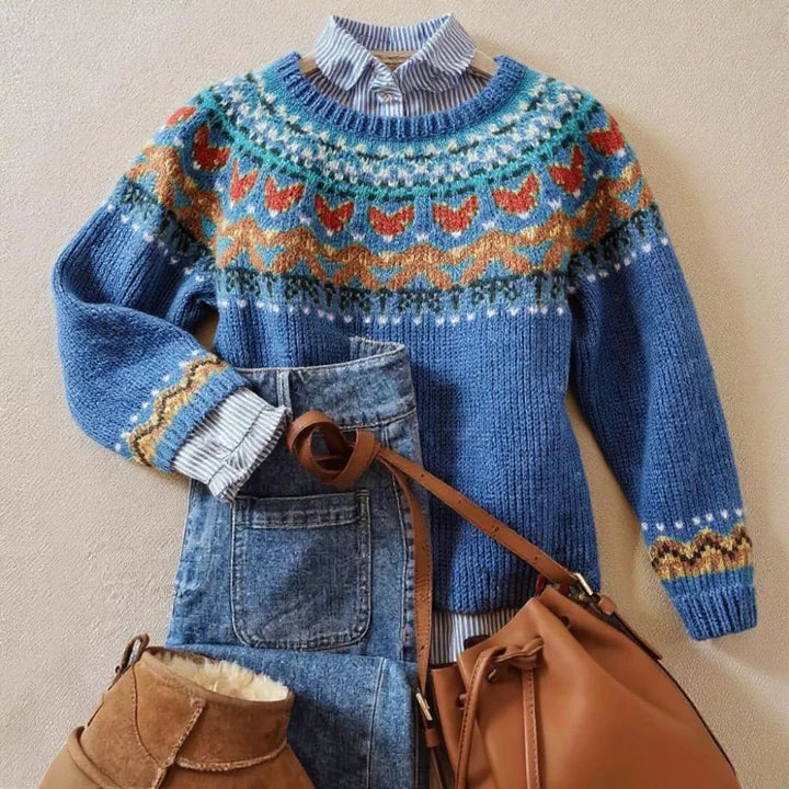 Women's blue knitted jumper with a multicoloured geometric patterned yoke