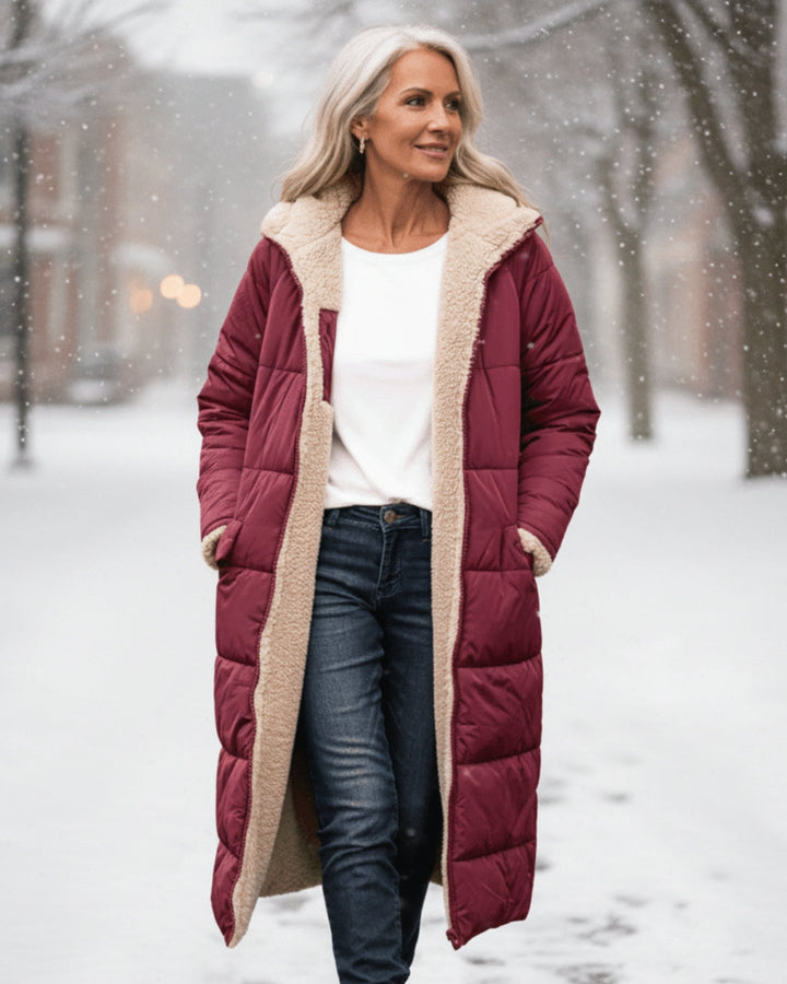 Women's long quilted hooded coat with contrasting textured lining