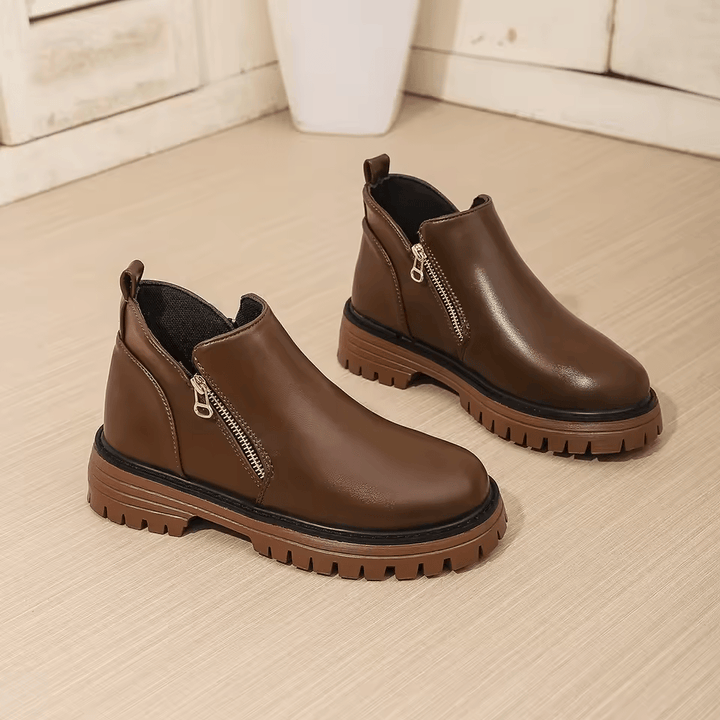 Women's platform ankle boots with side zippers and chunky lug soles