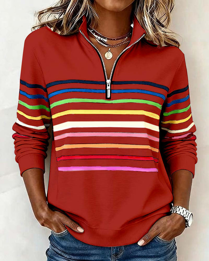 Women's striped half-zip sweatshirt with long sleeves and ribbed trims