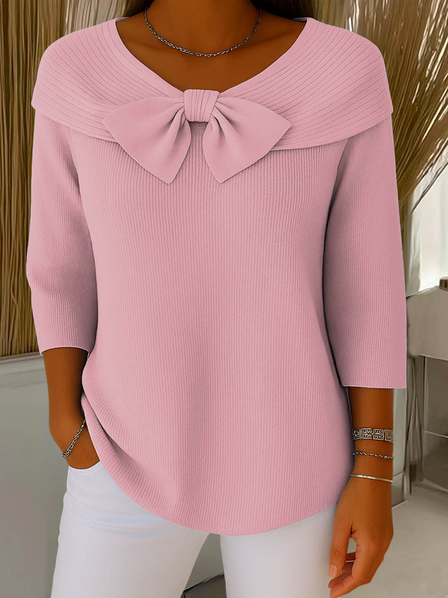Women's ribbed sweater with large front bow and three-quarter sleeves
