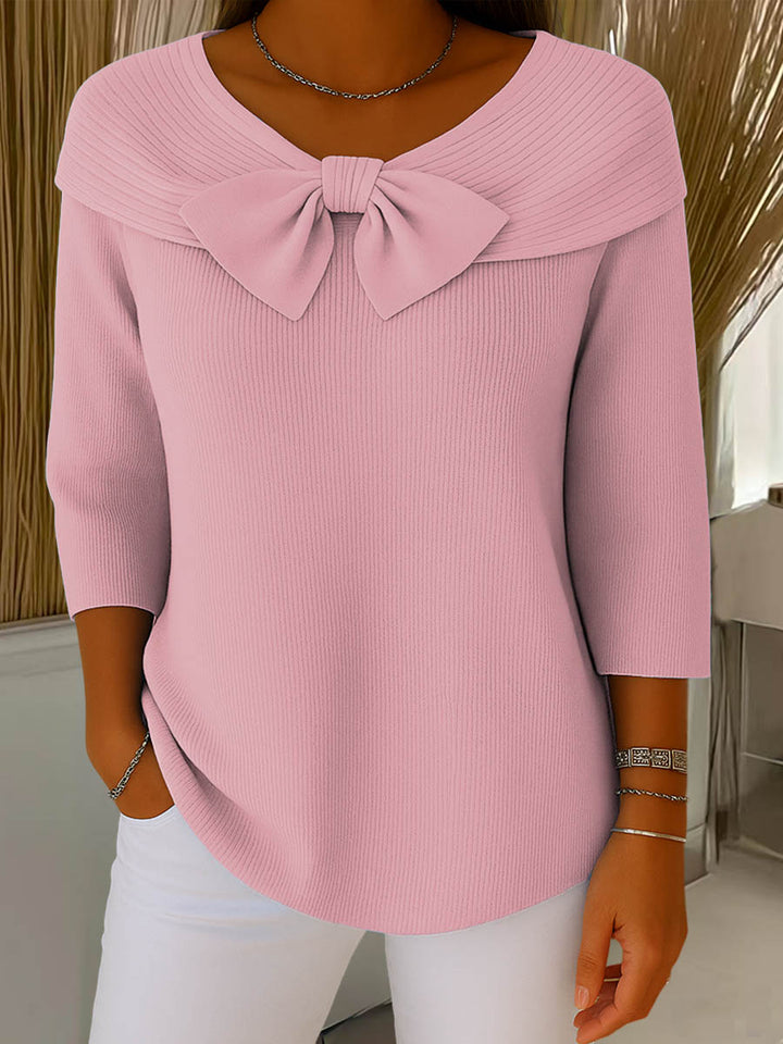 Women's ribbed sweater with large front bow and three-quarter sleeves