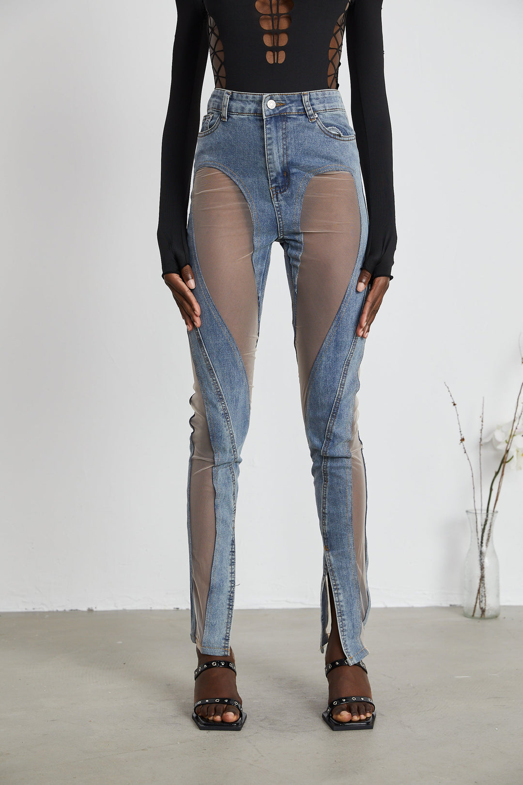Women's blue high-rise jeans with sheer leg panels