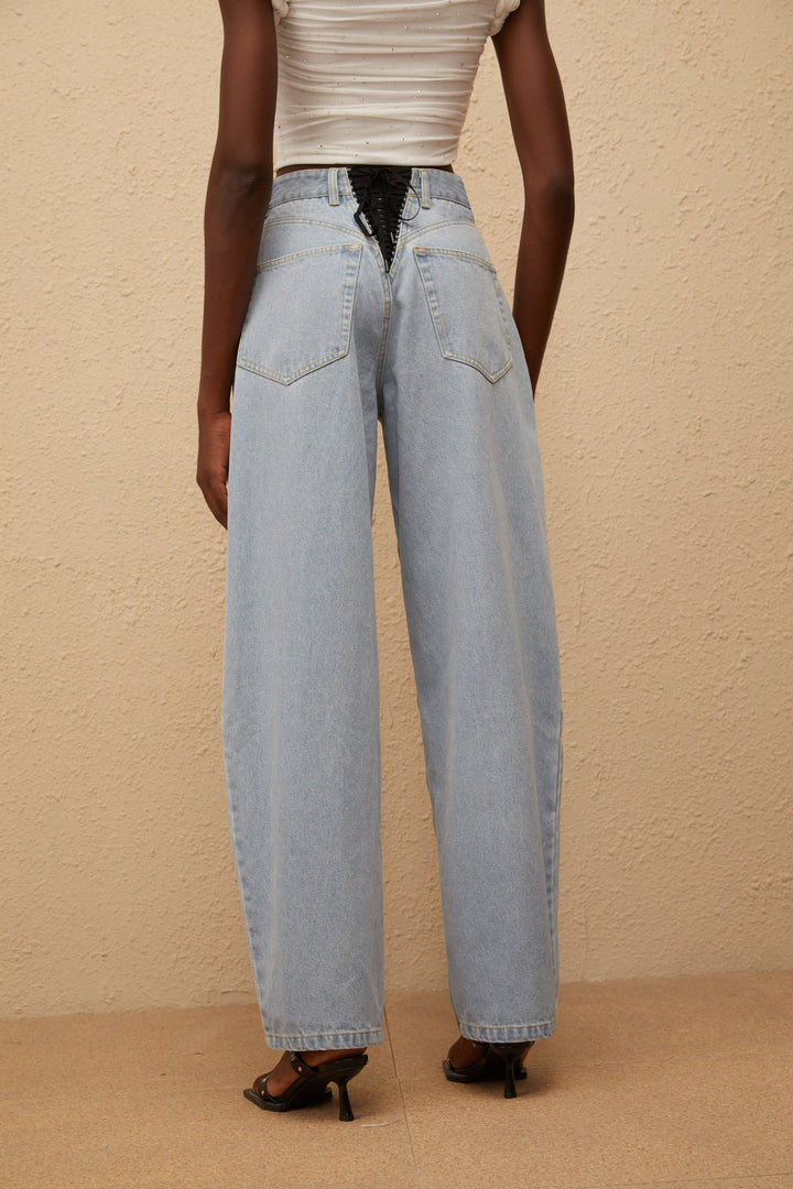 Women's light blue high-rise wide leg jeans with front and rear pockets