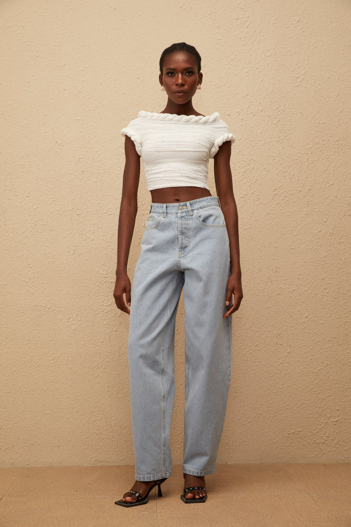 Women's light blue high-rise wide leg jeans with front and rear pockets