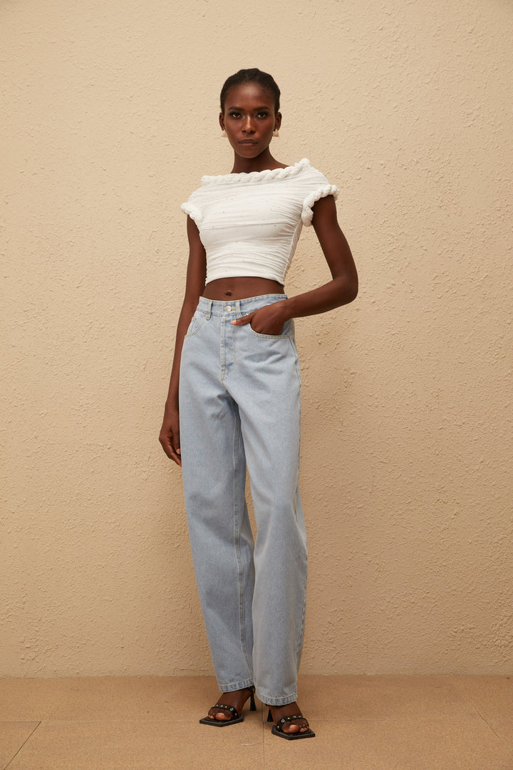 Women's light blue high-rise wide leg jeans with front and rear pockets