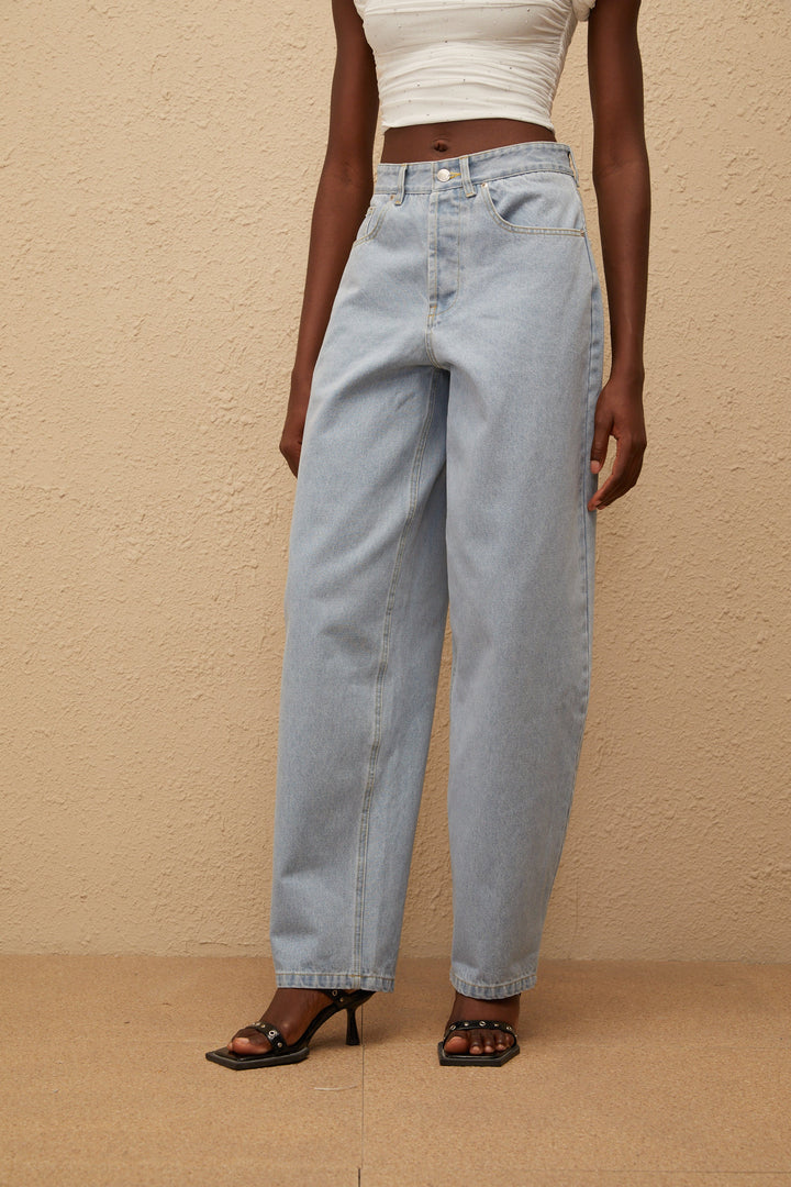 Women's light blue high-rise wide leg jeans with front and rear pockets