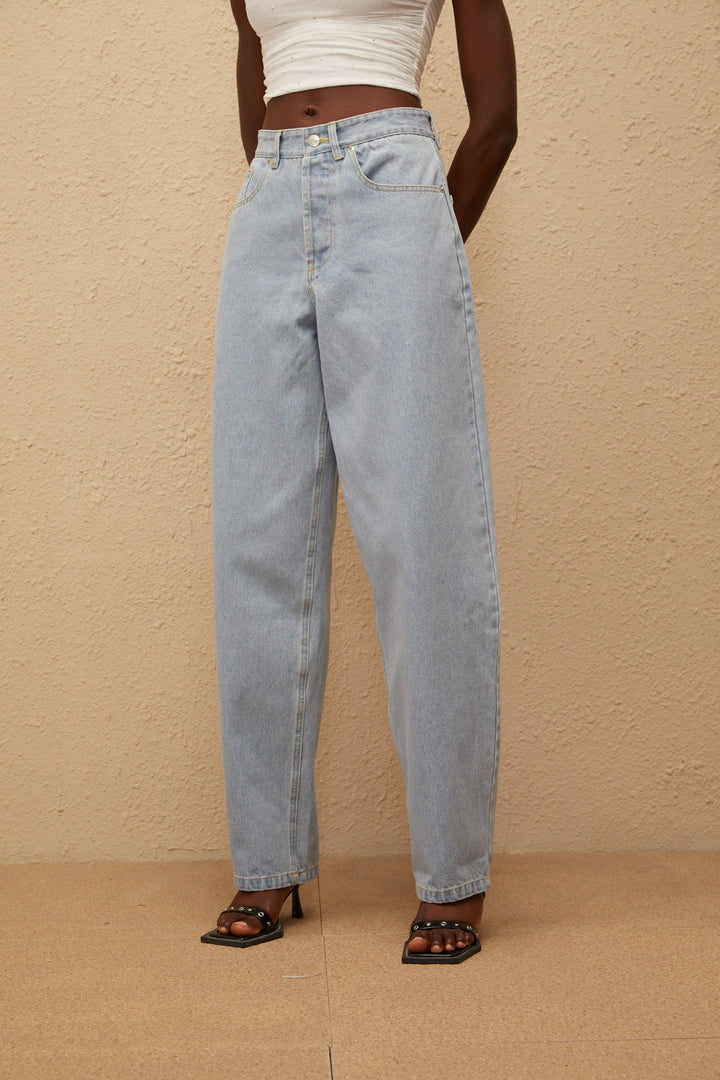 Women's light blue high-rise wide leg jeans with front and rear pockets