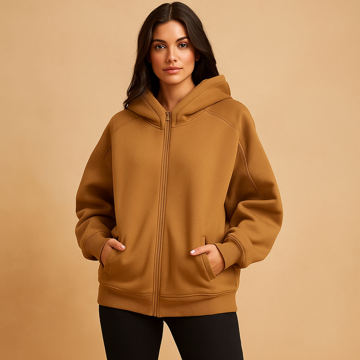 Women's oversized zip-up hooded sweatshirt with long sleeves and front pockets