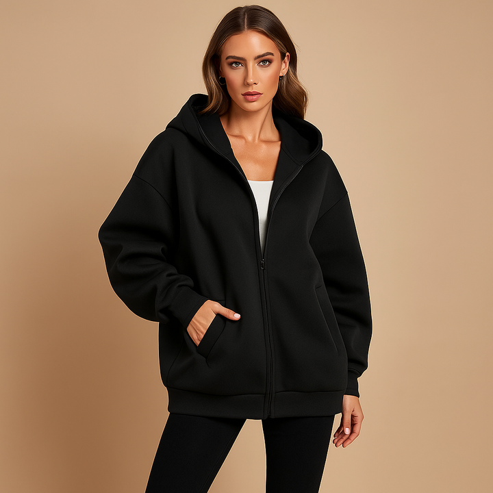 Women's oversized zip-up hooded sweatshirt with long sleeves and front pockets