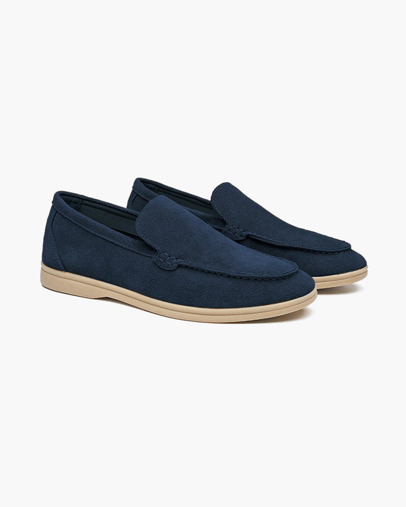 Unisex slip-on loafers with penny strap detail and flat soles
