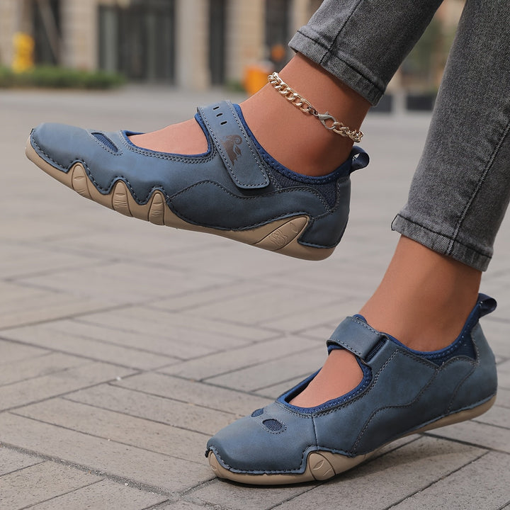 Mary Jane ballet flats with rounded toes, hook and loop straps and flat soles