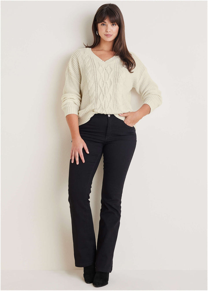 Women's cream cable knit V-neck sweater with long sleeves